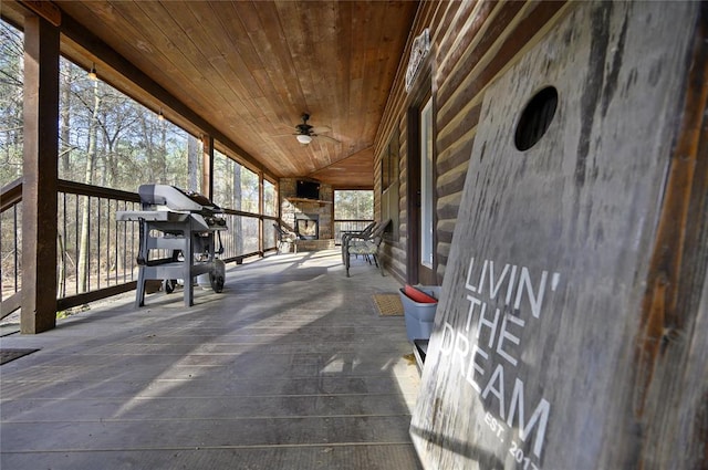 318 Camp Ranch Rd, Broken Bow, OK 74728 - porch featuring a ceiling fan and area for grilling