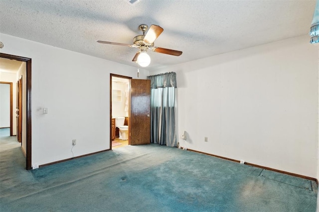 929 NE 5th St, Moore, OK 73160 - unfurnished bedroom featuring carpet, a textured ceiling, ensuite bath, and ceiling fan