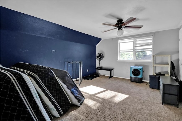 1001 NW 2nd St, Moore, OK 73160 - carpeted bedroom with vaulted ceiling and ceiling fan