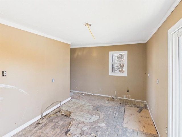 410 S Lowe Ave, Pauls Valley, OK 73075 - unfurnished room featuring crown molding and baseboards