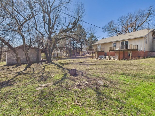 410 S Lowe Ave, Pauls Valley, OK 73075 - view of green lawn with a deck