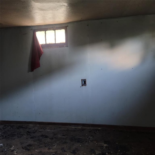 608 7th St, Woodward, OK 73801 - unfurnished room featuring baseboards