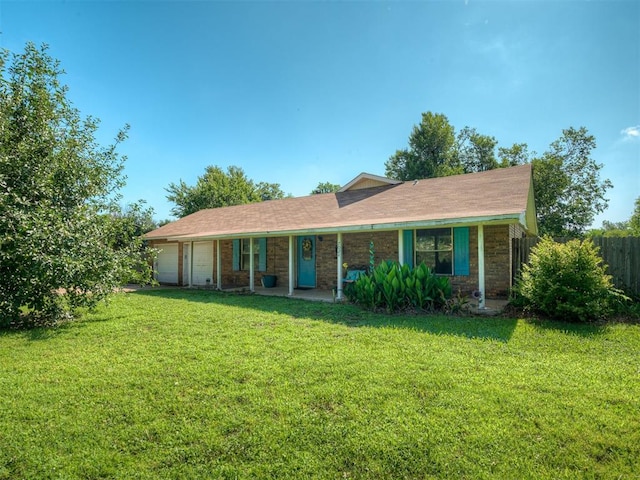 7024 S Kleiner Ave, Oklahoma City, OK 73097 - ranch-style house featuring an attached garage and covered porch
