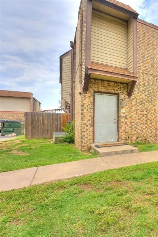 401 SE 12th Ave Unit 206, Norman, OK 73071 - view of front of house with brick siding