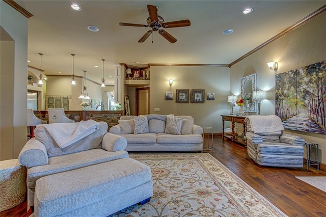 living area featuring ornamental molding, a ceiling fan, wood finished floors, and recessed lighting