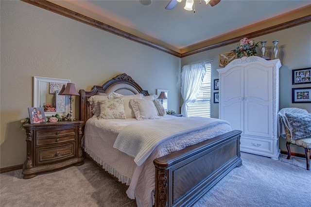 bedroom with light carpet, ornamental molding, and ceiling fan