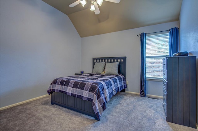 carpeted bedroom with lofted ceiling and a ceiling fan