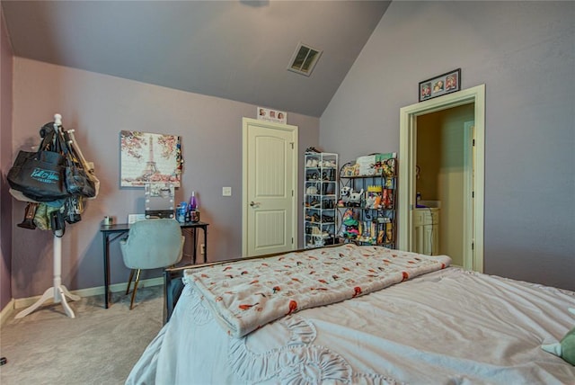 carpeted bedroom featuring vaulted ceiling and baseboards