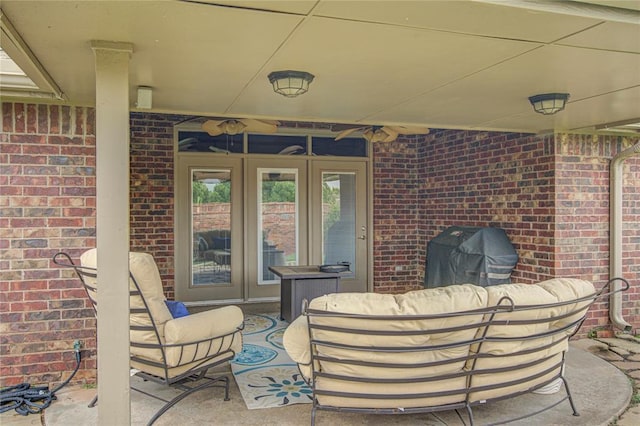 view of patio featuring french doors, a grill, and outdoor lounge area