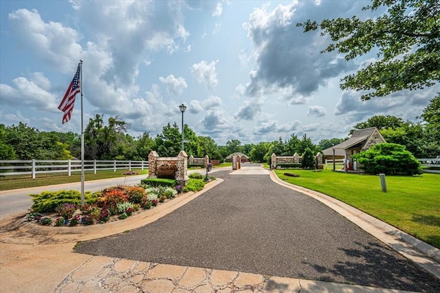 4450 Buffalo Hl, Guthrie, OK 73044 - view of asphalt road with street lights