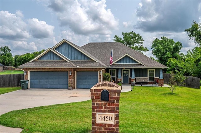 4450 Buffalo Hl, Guthrie, OK 73044 - craftsman house featuring board and batten siding, covered porch, brick siding, and a garage