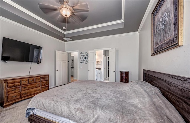 4450 Buffalo Hl, Guthrie, OK 73044 - carpeted bedroom with a raised ceiling, crown molding, a ceiling fan, and connected bathroom