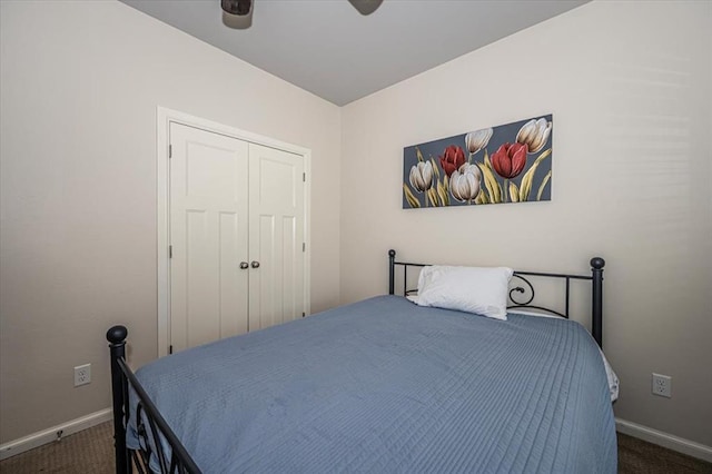 4450 Buffalo Hl, Guthrie, OK 73044 - bedroom with dark carpet, a ceiling fan, and a closet