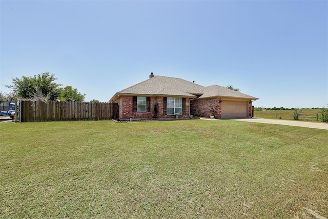 1106 Polk St, Piedmont, OK 73078 - single story home with an attached garage, brick siding, and driveway