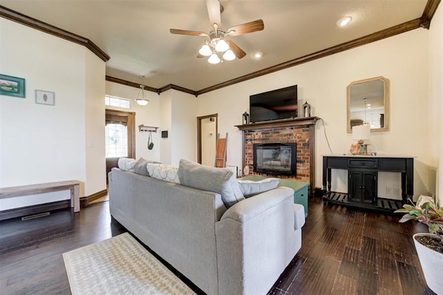 1106 Polk St, Piedmont, OK 73078 - living room with ornamental molding, a fireplace, ceiling fan, wood finished floors, and recessed lighting