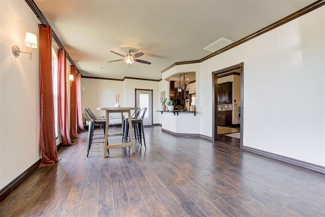 1106 Polk St, Piedmont, OK 73078 - dining area with ceiling fan, wood finished floors, and crown molding