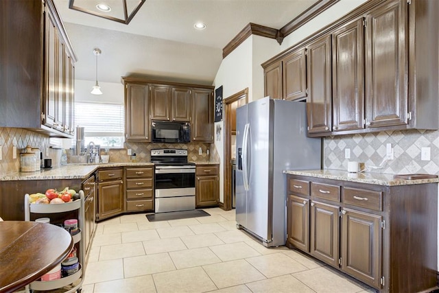 1106 Polk St, Piedmont, OK 73078 - kitchen featuring appliances with stainless steel finishes, decorative backsplash, light stone countertops, light tile patterned floors, and dark brown cabinetry