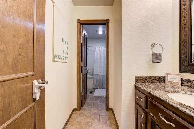 1106 Polk St, Piedmont, OK 73078 - bathroom with vanity and stone finish flooring
