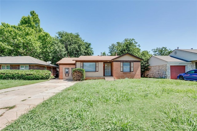 1417 Downing St, The Village, OK 73120 - ranch-style home featuring brick siding, concrete driveway, and a front yard