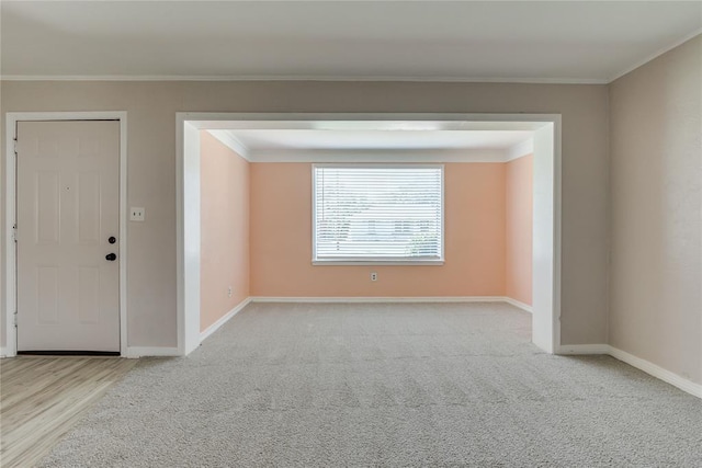 1417 Downing St, The Village, OK 73120 - carpeted empty room featuring ornamental molding and wood finished floors
