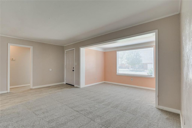 1417 Downing St, The Village, OK 73120 - unfurnished room featuring crown molding and light carpet