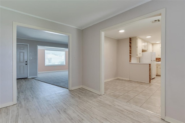 1417 Downing St, The Village, OK 73120 - spare room with ornamental molding and light wood-type flooring