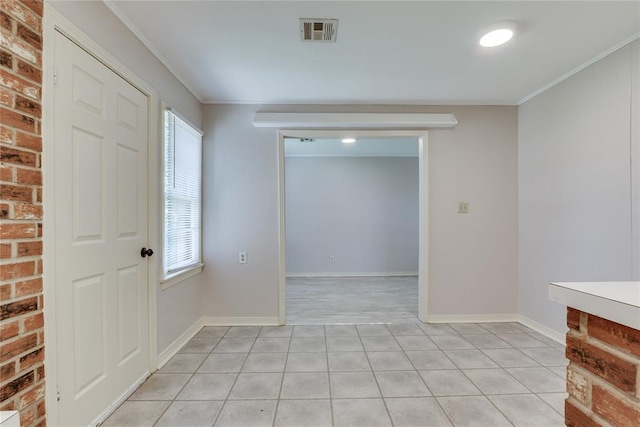 1417 Downing St, The Village, OK 73120 - unfurnished room with ornamental molding and light tile patterned floors