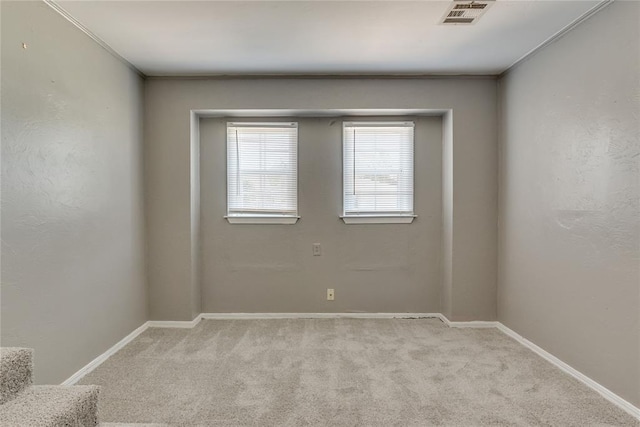 1417 Downing St, The Village, OK 73120 - spare room featuring carpet floors and baseboards
