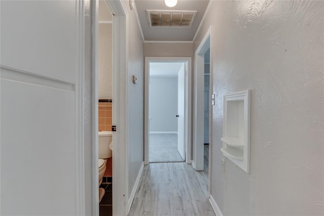 1417 Downing St, The Village, OK 73120 - hallway featuring light wood-type flooring and ornamental molding