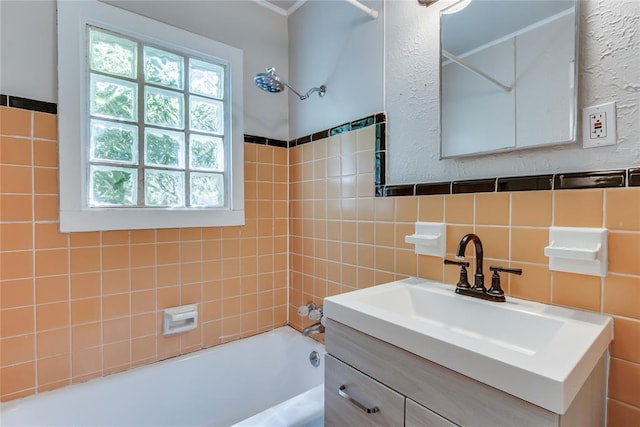 1417 Downing St, The Village, OK 73120 - bathroom featuring bathtub / shower combination, vanity, and tile walls