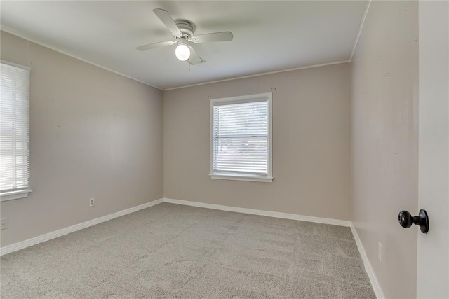 1417 Downing St, The Village, OK 73120 - spare room with carpet flooring, a ceiling fan, and crown molding