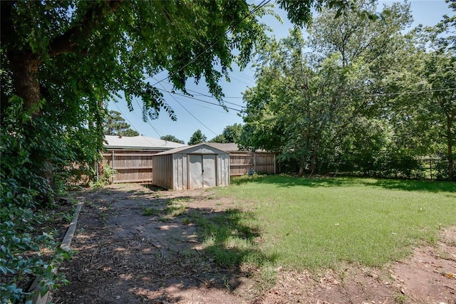 1417 Downing St, The Village, OK 73120 - fenced backyard featuring a storage shed