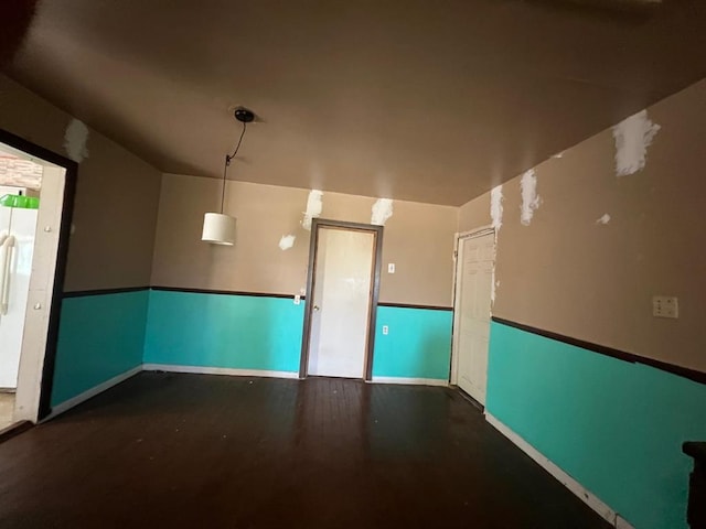 1139 E 2nd St, Cushing, OK 74023 - unfurnished room featuring baseboards