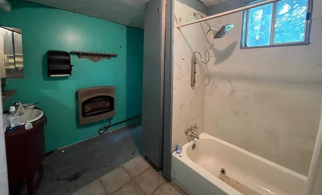 1139 E 2nd St, Cushing, OK 74023 - bathroom featuring heating unit and shower / bath combination