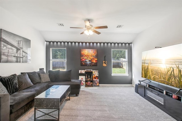 11712 NW 130th St, Piedmont, OK 73078 - carpeted living area with ceiling fan, plenty of natural light, and vaulted ceiling