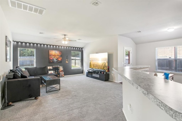 11712 NW 130th St, Piedmont, OK 73078 - living room with carpet flooring, vaulted ceiling, and ceiling fan