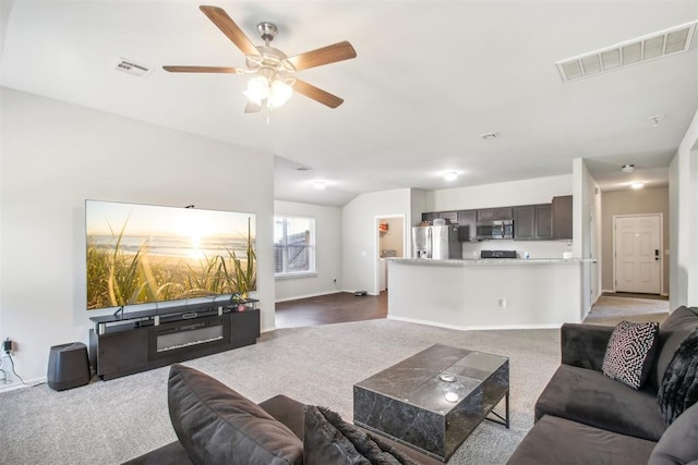 11712 NW 130th St, Piedmont, OK 73078 - living room with light colored carpet and ceiling fan