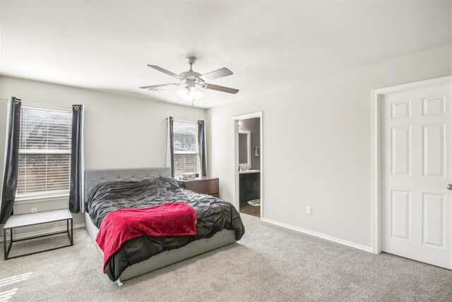 11712 NW 130th St, Piedmont, OK 73078 - bedroom with carpet, connected bathroom, and a ceiling fan