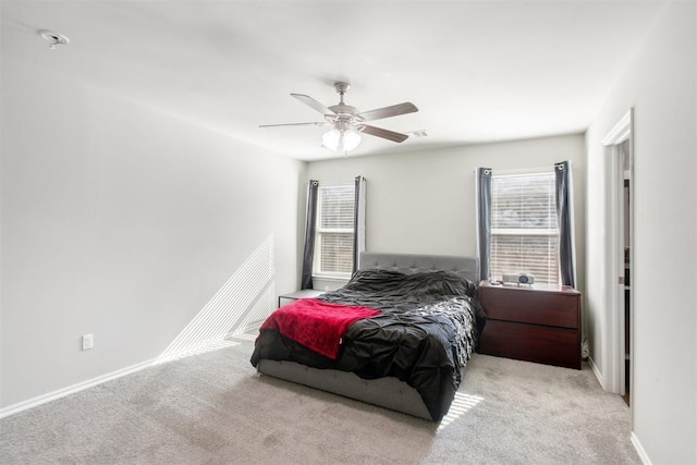 11712 NW 130th St, Piedmont, OK 73078 - bedroom with carpet, multiple windows, and ceiling fan