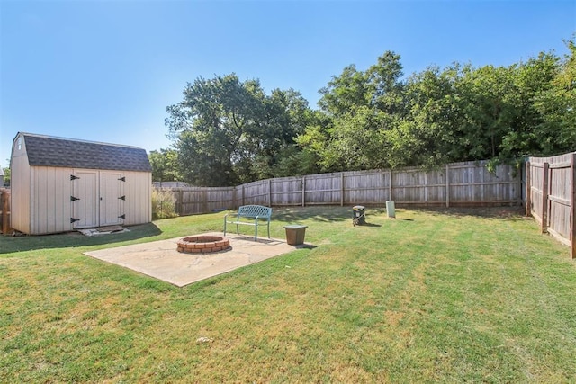 11712 NW 130th St, Piedmont, OK 73078 - fenced backyard with a fire pit, a shed, and a patio area