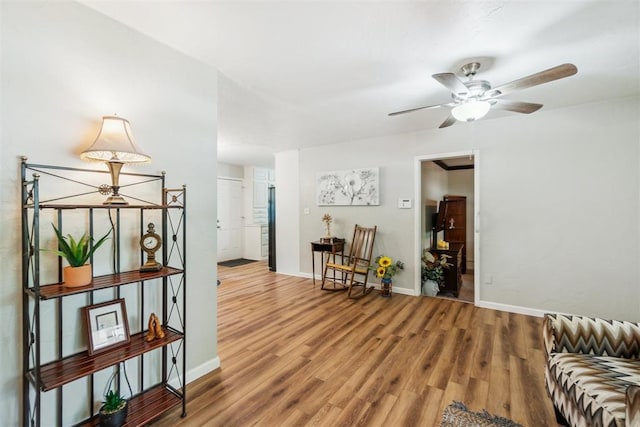 1726 Caddell Ln, Norman, OK 73069 - sitting room with a ceiling fan and wood finished floors