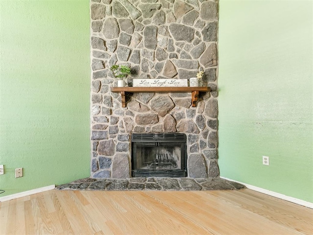 1916 Twin Tree Dr, Norman, OK 73071 - detailed view of wood finished floors and a fireplace