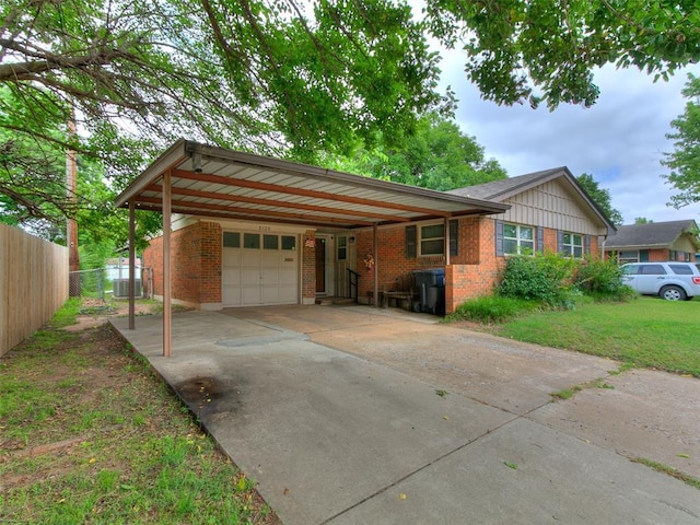 2120 N Divis Ave, Bethany, OK 73008 - ranch-style home with a carport, concrete driveway, brick siding, and an attached garage