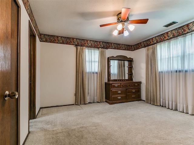 2120 N Divis Ave, Bethany, OK 73008 - carpeted empty room featuring a ceiling fan