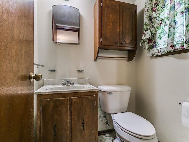 2120 N Divis Ave, Bethany, OK 73008 - bathroom featuring toilet and vanity