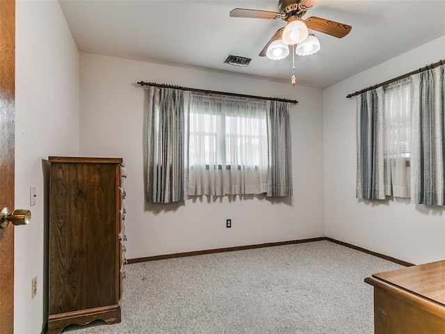 2120 N Divis Ave, Bethany, OK 73008 - carpeted empty room featuring ceiling fan and baseboards