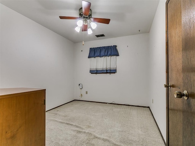 2120 N Divis Ave, Bethany, OK 73008 - carpeted spare room featuring ceiling fan and baseboards