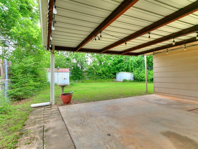 2120 N Divis Ave, Bethany, OK 73008 - view of patio featuring a storage shed