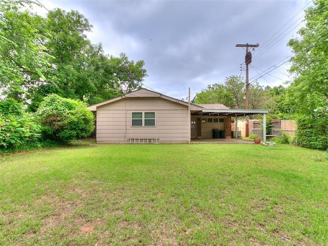 2120 N Divis Ave, Bethany, OK 73008 - rear view of house with a patio