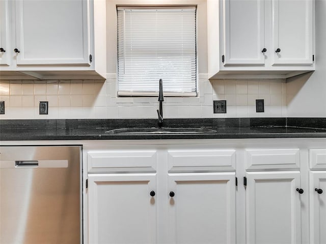 1810 Spring Ave, Stroud, OK 74079 - kitchen featuring stainless steel dishwasher, white cabinets, decorative backsplash, and dark stone countertops